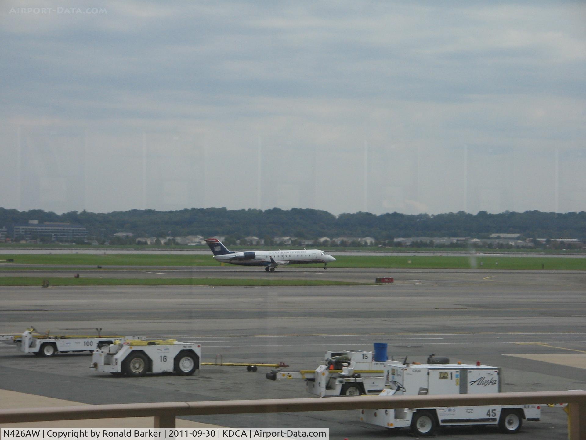 N426AW, 2002 Bombardier CRJ-200LR (CL-600-2B19) C/N 7669, Departing DCA
