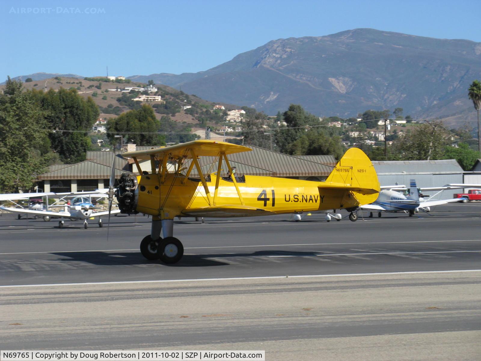 N69765, 1941 Boeing A75N1 (PT17) C/N 75-1044, 1941 Boeing Stearman A75N1 as Navy N2S1, Continental W670-5 220 Hp, wheel landing roll Rwy 22