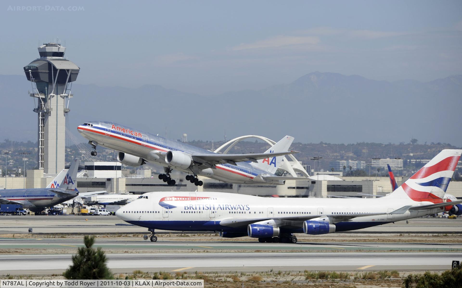 N787AL, 2000 Boeing 777-223 C/N 30010, Departing LAX with British Airways arrival waiting on Taxiway