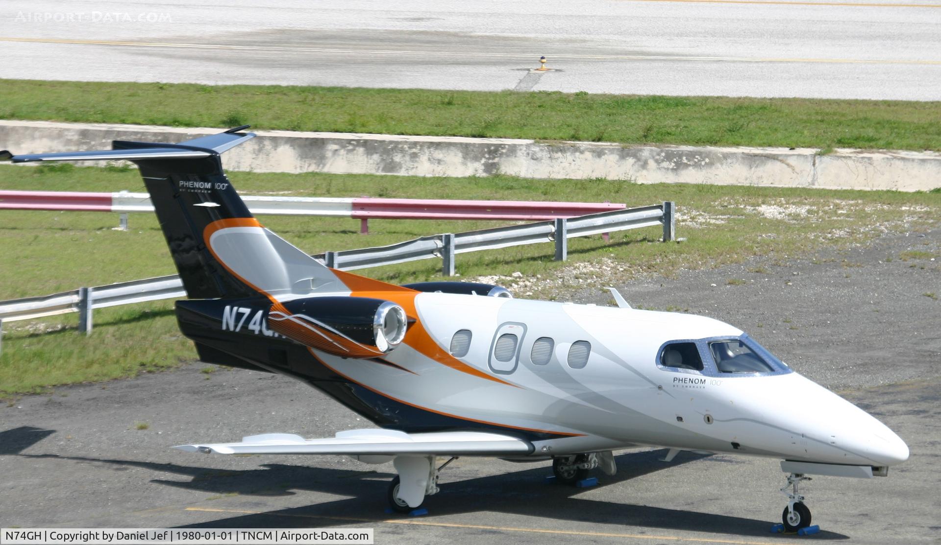 N74GH, 2011 Embraer EMB-500 Phenom 100 C/N 50000252, Park at TNCM
