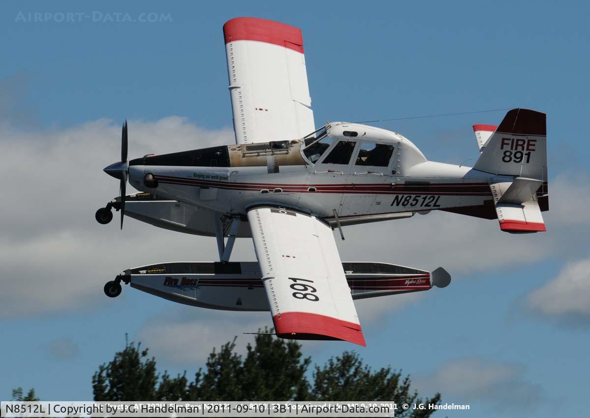 N8512L, 2004 Air Tractor Inc AT-802 C/N 802-0170, Banking over Moosehead Lake ME