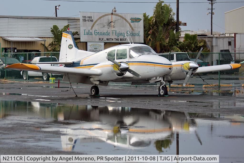 N211CR, 1955 Piper PA-23 C/N 23-358, Reflection in the water.