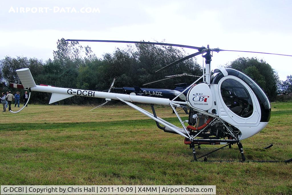 G-DCBI, 2007 Schweizer 269C-1 C/N 0295, At a fly-in at Manley Mere, Cheshire. Organised by Helicentre Liverpool in aid of the North West Air Ambulance