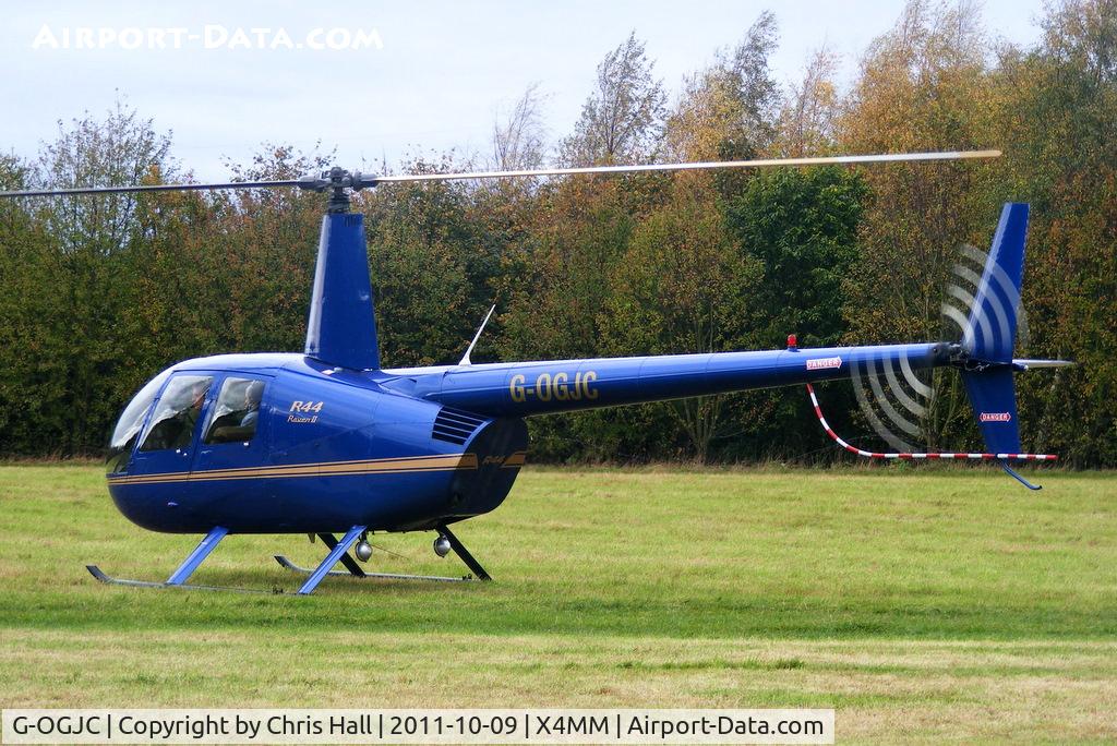 G-OGJC, 2009 Robinson R44 Raven II C/N 11653, At a fly-in at Manley Mere, Cheshire. Organised by Helicentre Liverpool in aid of the North West Air Ambulance