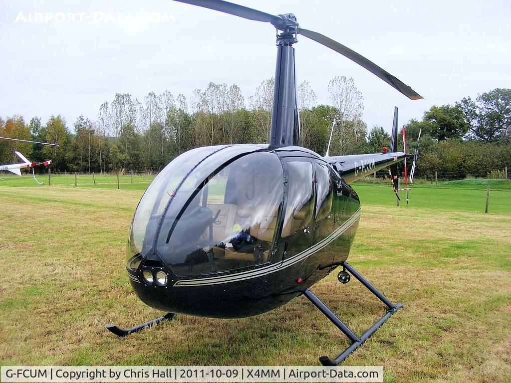 G-FCUM, 2007 Robinson R44 Raven II C/N 11723, At a fly-in at Manley Mere, Cheshire. Organised by Helicentre Liverpool in aid of the North West Air Ambulance
