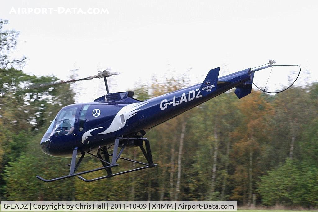 G-LADZ, 1993 Enstrom 480 C/N 5001, At a fly-in at Manley Mere, Cheshire. Organised by Helicentre Liverpool in aid of the North West Air Ambulance