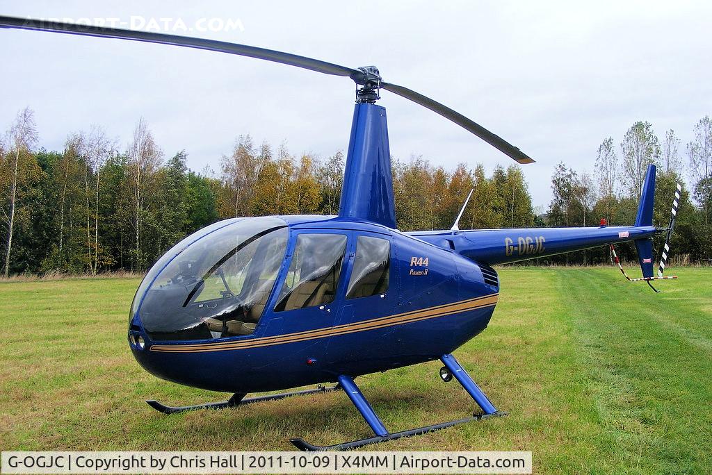 G-OGJC, 2009 Robinson R44 Raven II C/N 11653, At a fly-in at Manley Mere, Cheshire. Organised by Helicentre Liverpool in aid of the North West Air Ambulance