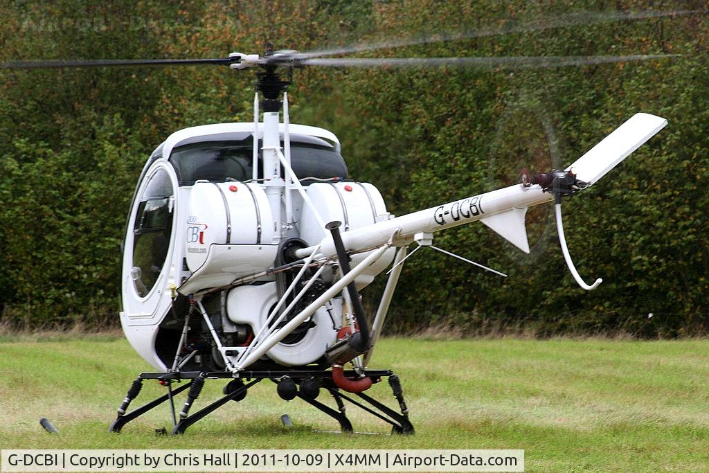 G-DCBI, 2007 Schweizer 269C-1 C/N 0295, At a fly-in at Manley Mere, Cheshire. Organised by Helicentre Liverpool in aid of the North West Air Ambulance