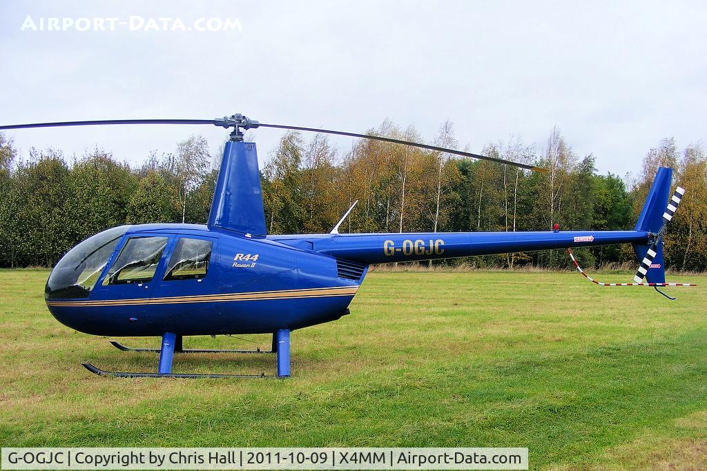 G-OGJC, 2009 Robinson R44 Raven II C/N 11653, At a fly-in at Manley Mere, Cheshire. Organised by Helicentre Liverpool in aid of the North West Air Ambulance