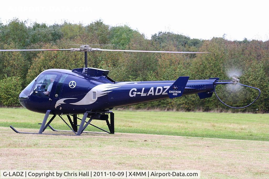 G-LADZ, 1993 Enstrom 480 C/N 5001, At a fly-in at Manley Mere, Cheshire. Organised by Helicentre Liverpool in aid of the North West Air Ambulance