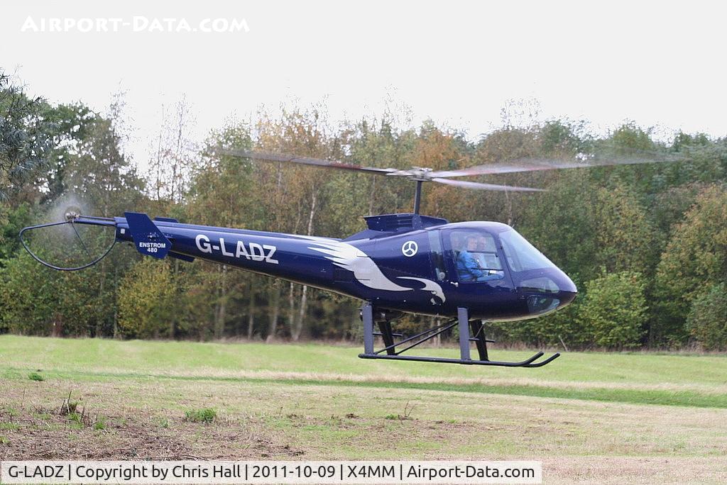 G-LADZ, 1993 Enstrom 480 C/N 5001, At a fly-in at Manley Mere, Cheshire. Organised by Helicentre Liverpool in aid of the North West Air Ambulance