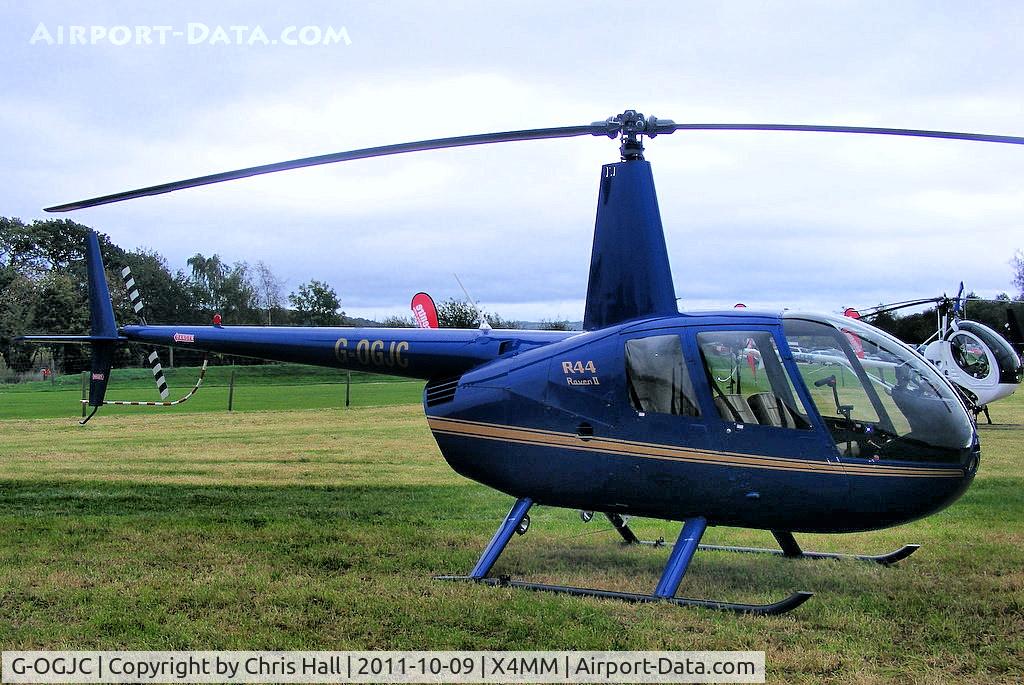 G-OGJC, 2009 Robinson R44 Raven II C/N 11653, At a fly-in at Manley Mere, Cheshire. Organised by Helicentre Liverpool in aid of the North West Air Ambulance