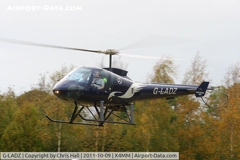 G-LADZ, 1993 Enstrom 480 C/N 5001, At a fly-in at Manley Mere, Cheshire. Organised by Helicentre Liverpool in aid of the North West Air Ambulance
