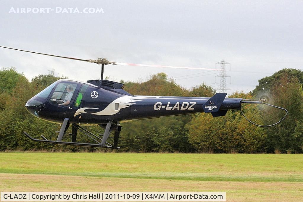 G-LADZ, 1993 Enstrom 480 C/N 5001, At a fly-in at Manley Mere, Cheshire. Organised by Helicentre Liverpool in aid of the North West Air Ambulance