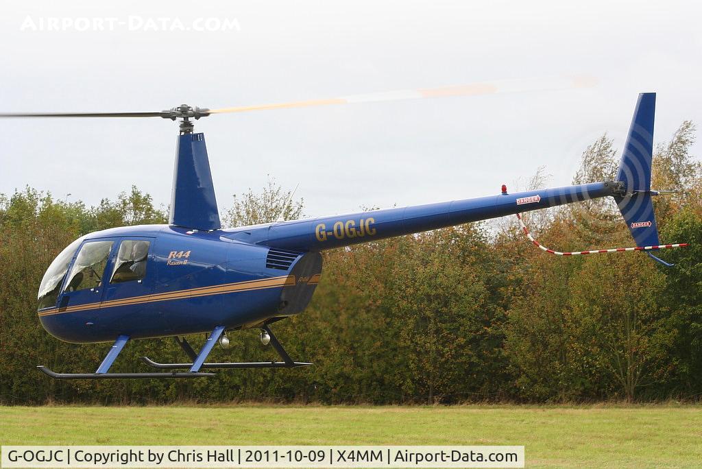 G-OGJC, 2009 Robinson R44 Raven II C/N 11653, At a fly-in at Manley Mere, Cheshire. Organised by Helicentre Liverpool in aid of the North West Air Ambulance