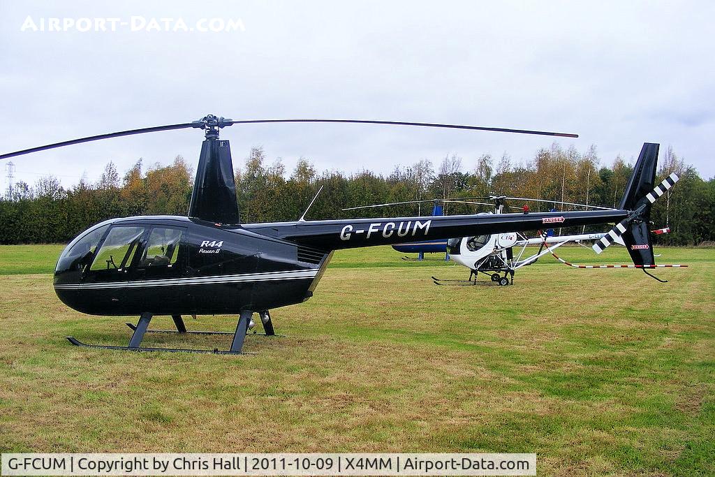 G-FCUM, 2007 Robinson R44 Raven II C/N 11723, At a fly-in at Manley Mere, Cheshire. Organised by Helicentre Liverpool in aid of the North West Air Ambulance