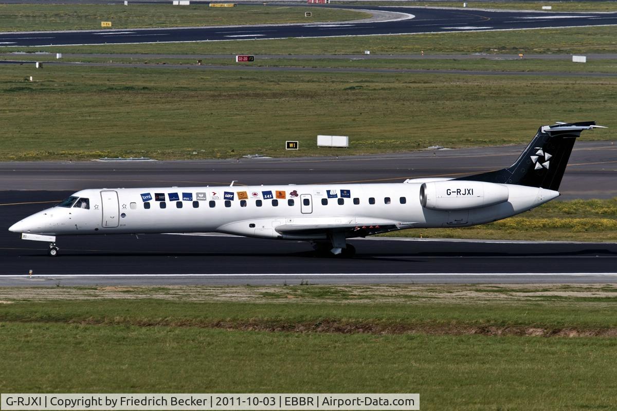 G-RJXI, 2001 Embraer EMB-145EP (ERJ-145EP) C/N 145454, decelerating after touchdown