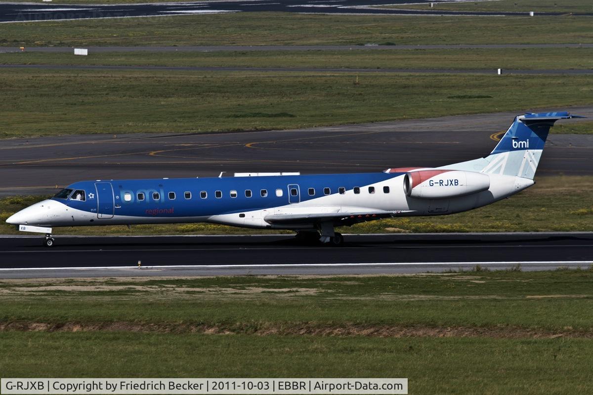 G-RJXB, 1999 Embraer EMB-145EP (ERJ-145EP) C/N 145142, decelerating after touchdown