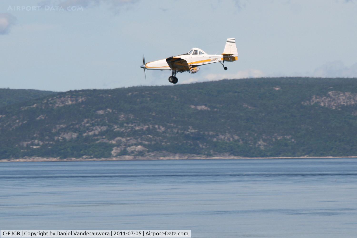 C-FJGB, 1988 PZL-Mielec M-18A Dromader C/N 1Z018-11, Flying over Saint-Laurent River (Tadoussac-Saguenay)