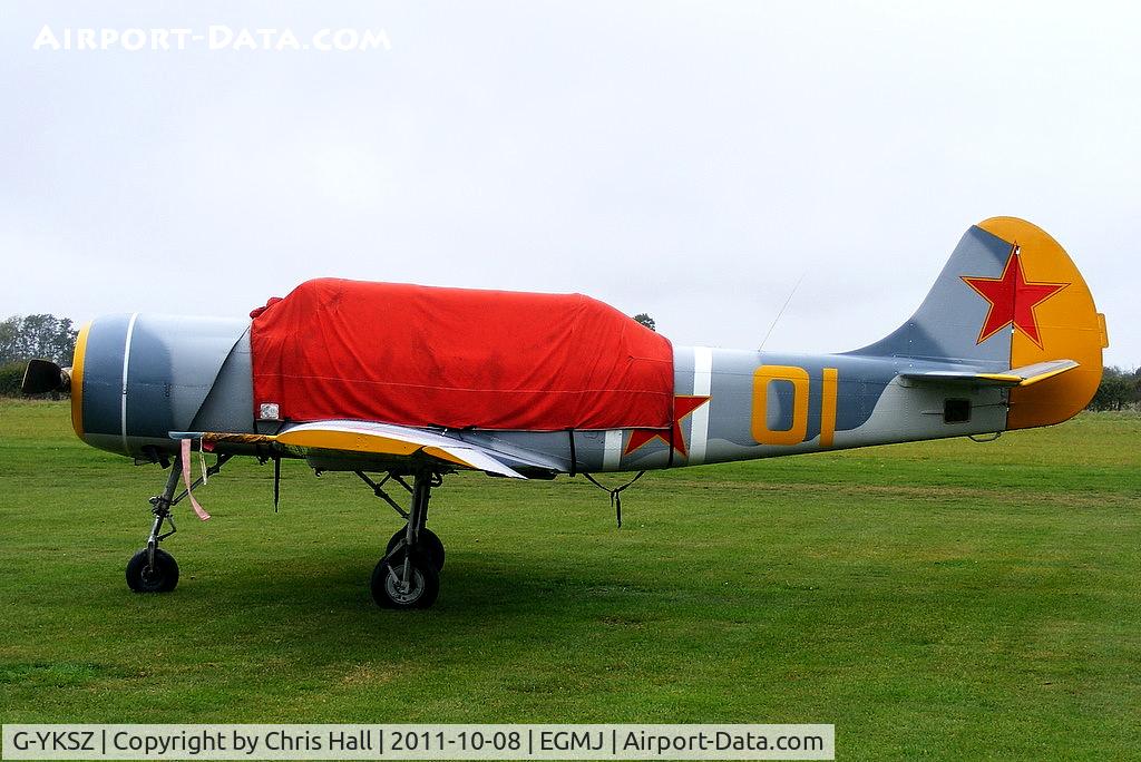 G-YKSZ, 1993 Yakovlev (Aerostar) Yak-52 C/N 9311709, at Fullers Hill Farm, Little Gransden
