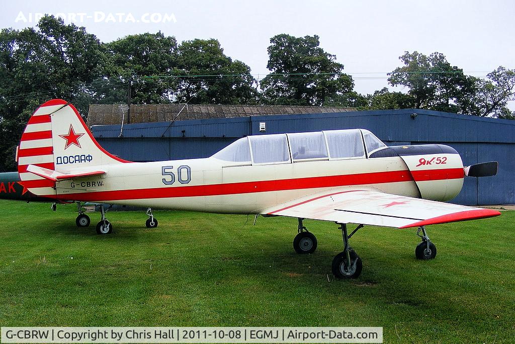 G-CBRW, 1991 Yakovlev (Aerostar) Yak-52 C/N 9111415, at Fullers Hill Farm, Little Gransden