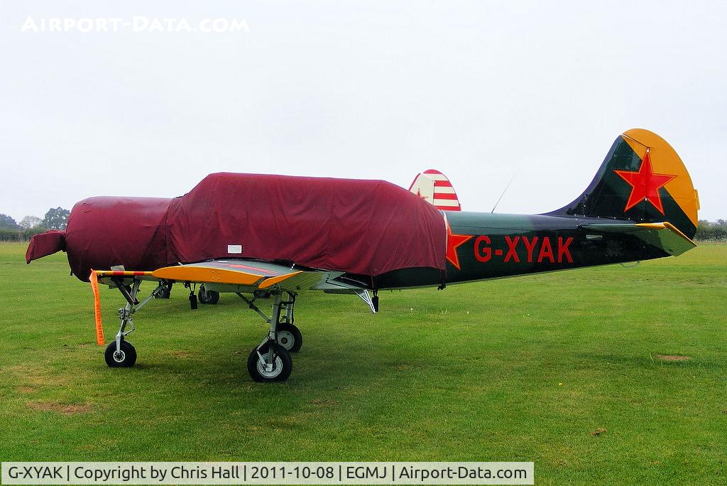 G-XYAK, 1989 Bacau Yak-52 C/N 899413, at Fullers Hill Farm, Little Gransden