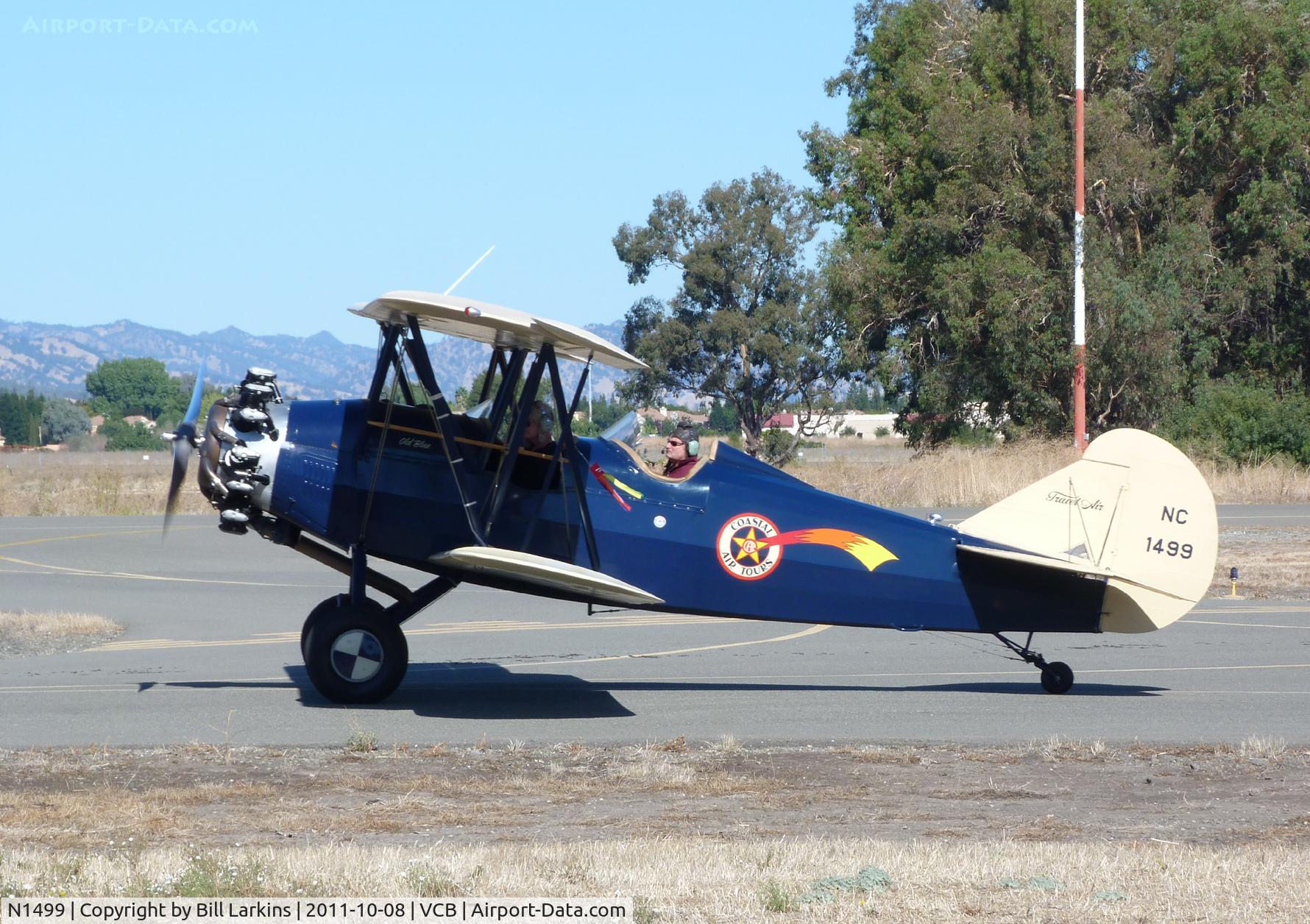 N1499, Curtiss-Wright Travel Air 4000 C/N 164, Selling rides during Mustang Day.
