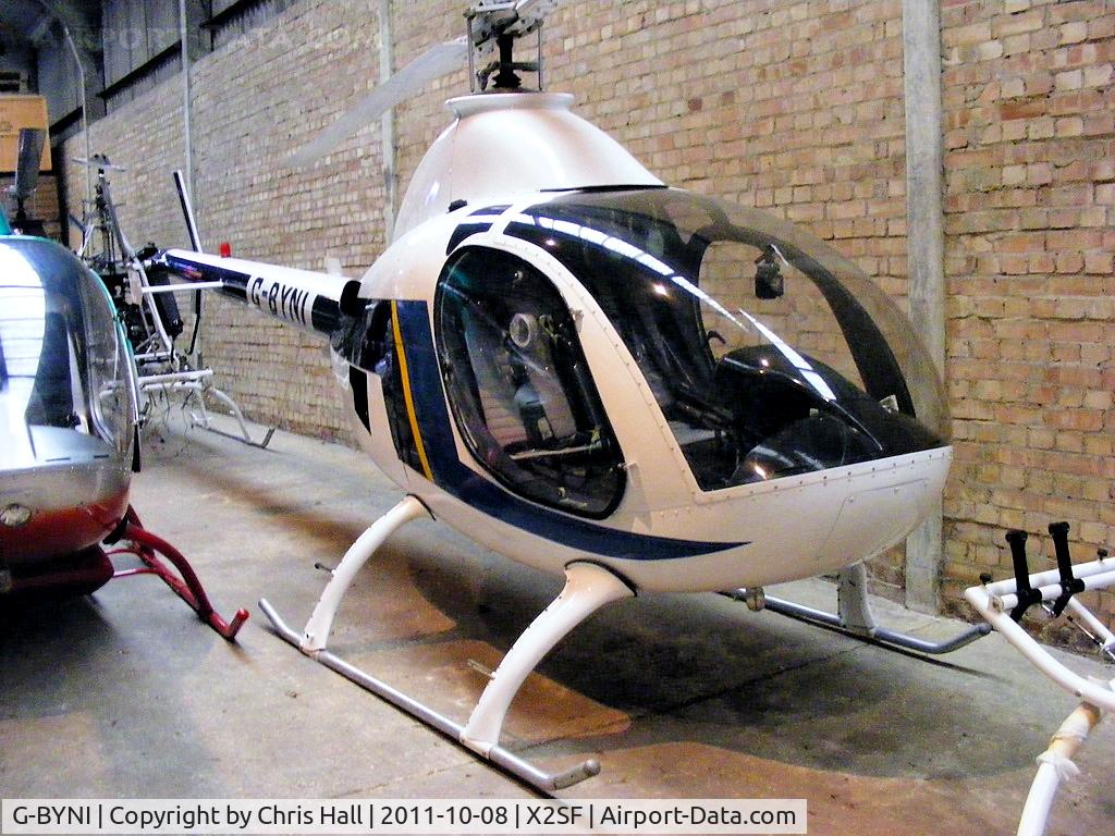 G-BYNI, 1999 Rotorway Exec 90 C/N 5216, At Rotorway UK, Street Farm, Takeley