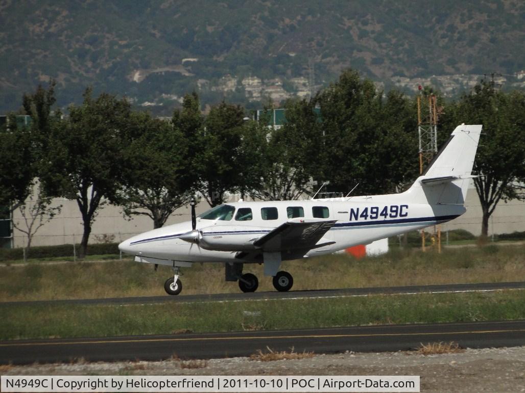 N4949C, 1982 Cessna T303 Crusader C/N T30300128, Starting take off roll westbound on runway 26L