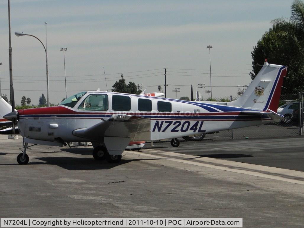 N7204L, 1984 Beech B36TC Bonanza C/N EA-431, Parked in Howard Aviation parking area