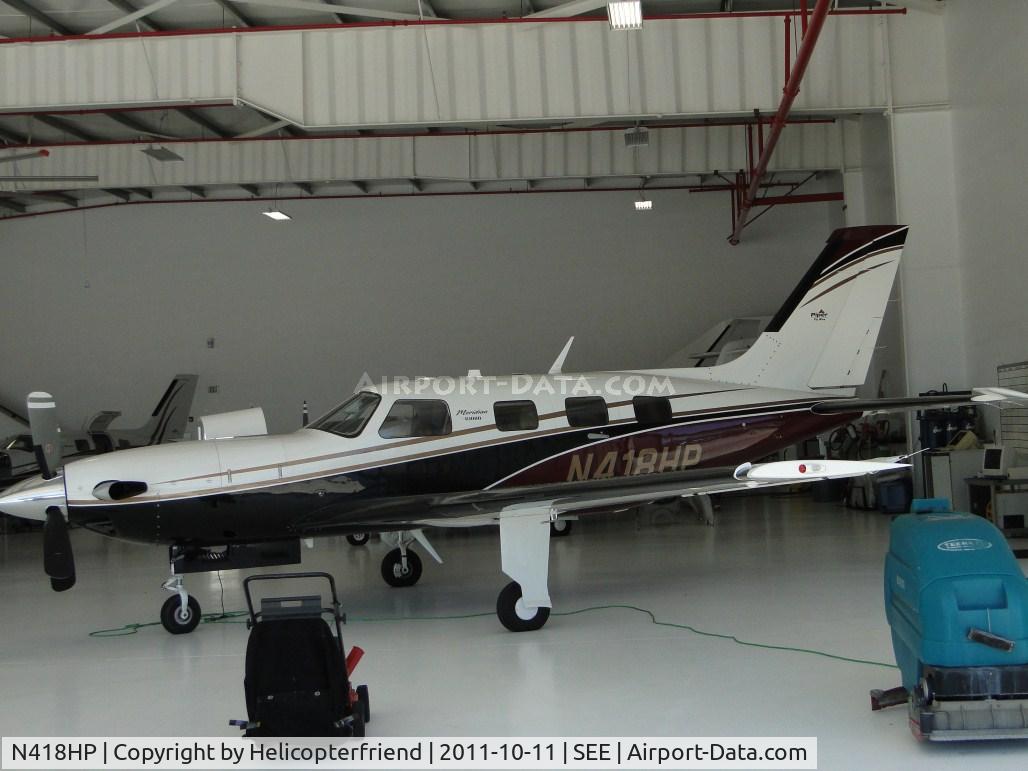 N418HP, 2010 Piper PA-46-500TP C/N 4697418, Parked in a hanger having maintenance performed