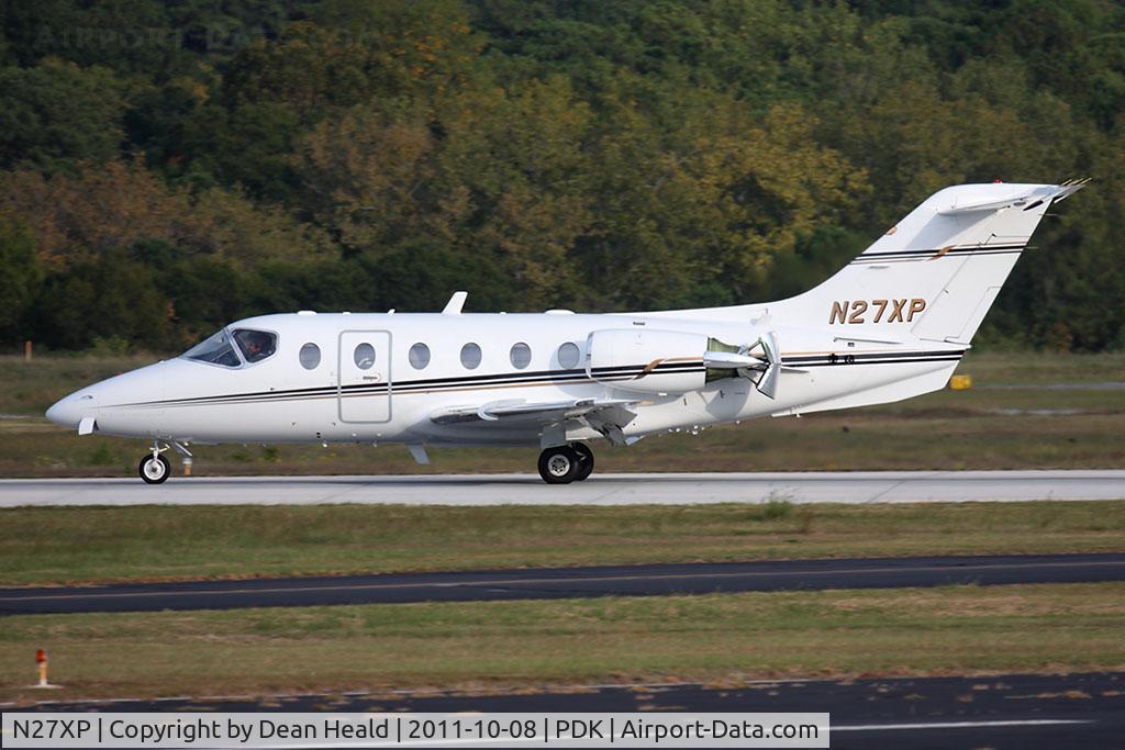 N27XP, 2000 Raytheon Aircraft Company 400A C/N RK-266, MCM Transport Inc 2000 Beechcraft 400A Beechjet N27XP rolling out on RWY 2R after arrival from Kissimmee Gateway Airport (KISM).