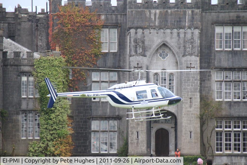 EI-PMI, 1981 Agusta AB-206B JetRanger II C/N 8614, EI-PMI Jet Ranger just airborne in front of Birr Castle, Birr, Co Ofally during the 2011 Irish Ballooning Championships