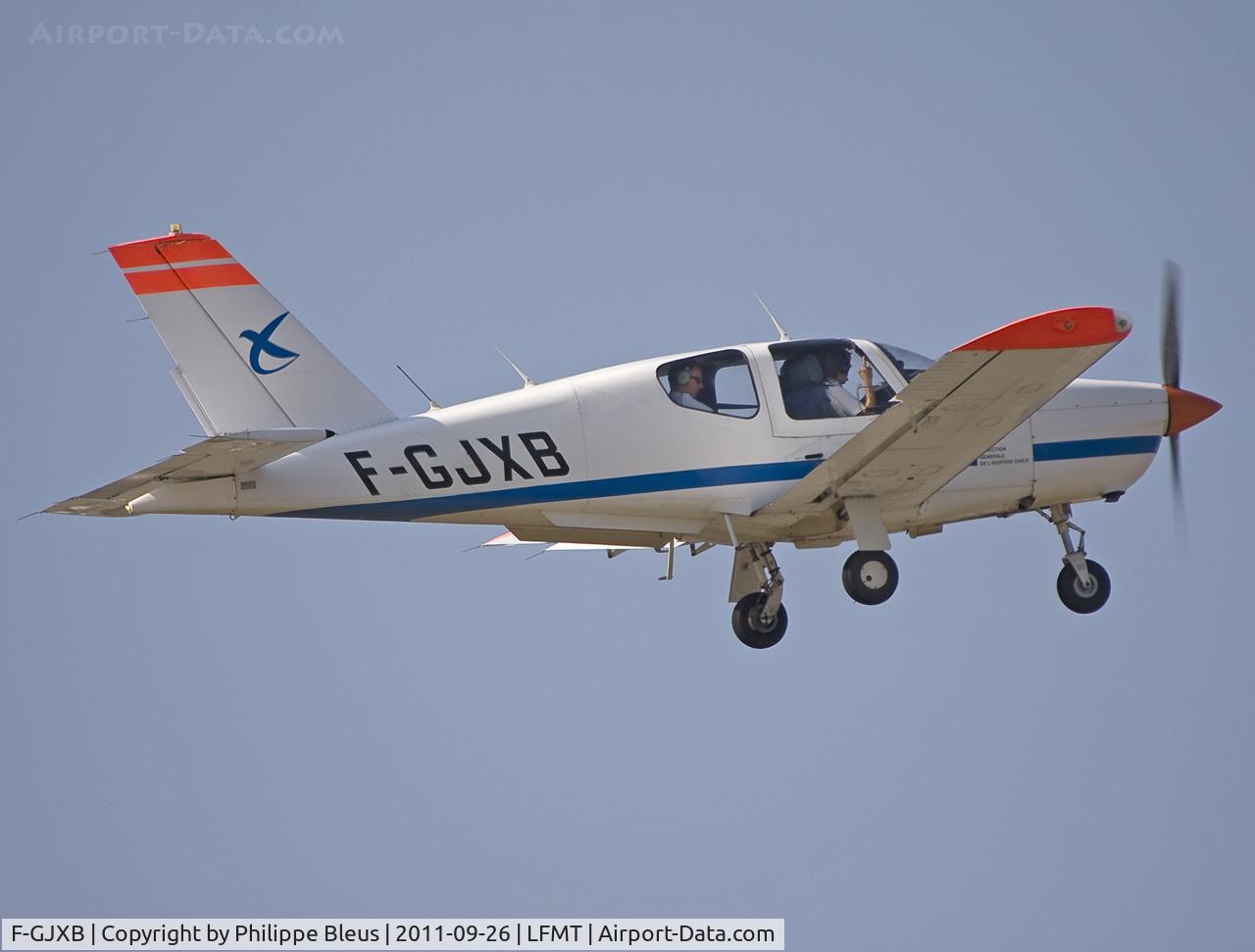 F-GJXB, 1991 Socata TB-20 C/N 1304, Climbing from rwy 13L. Beg your pardon for the light conditions which were too vertical at that time.