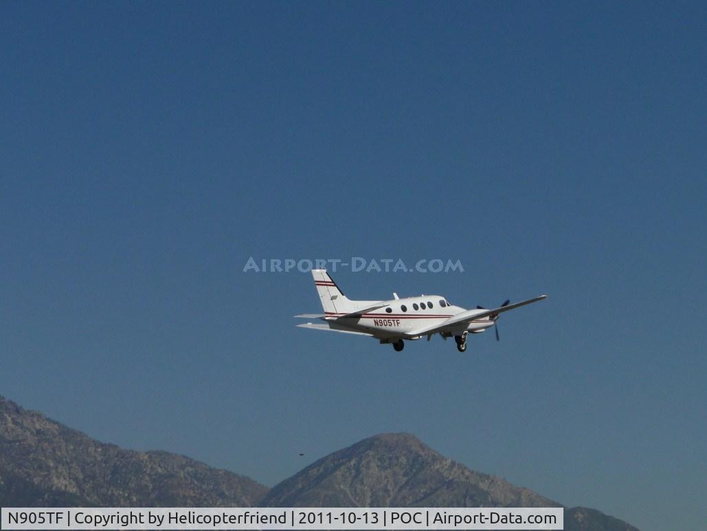 N905TF, 1972 Beech E90 King Air C/N LW-6, Eastbound and retracting landing gear after take off from runway 8R