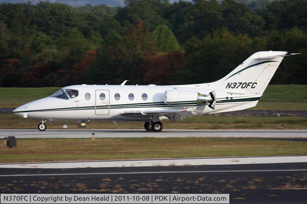 N370FC, 2004 Raytheon Aircraft Company 400A C/N RK-378, Franklin Corporation Raytheon Hawker 400XP N370FC rolling out on RWY 2R after landing.