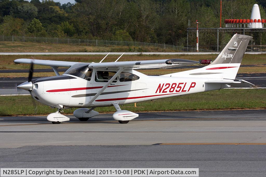 N285LP, 2003 Cessna 182T Skylane C/N 18281285, 2003 Cessna 182T N285LP taxiing to parking after landing.