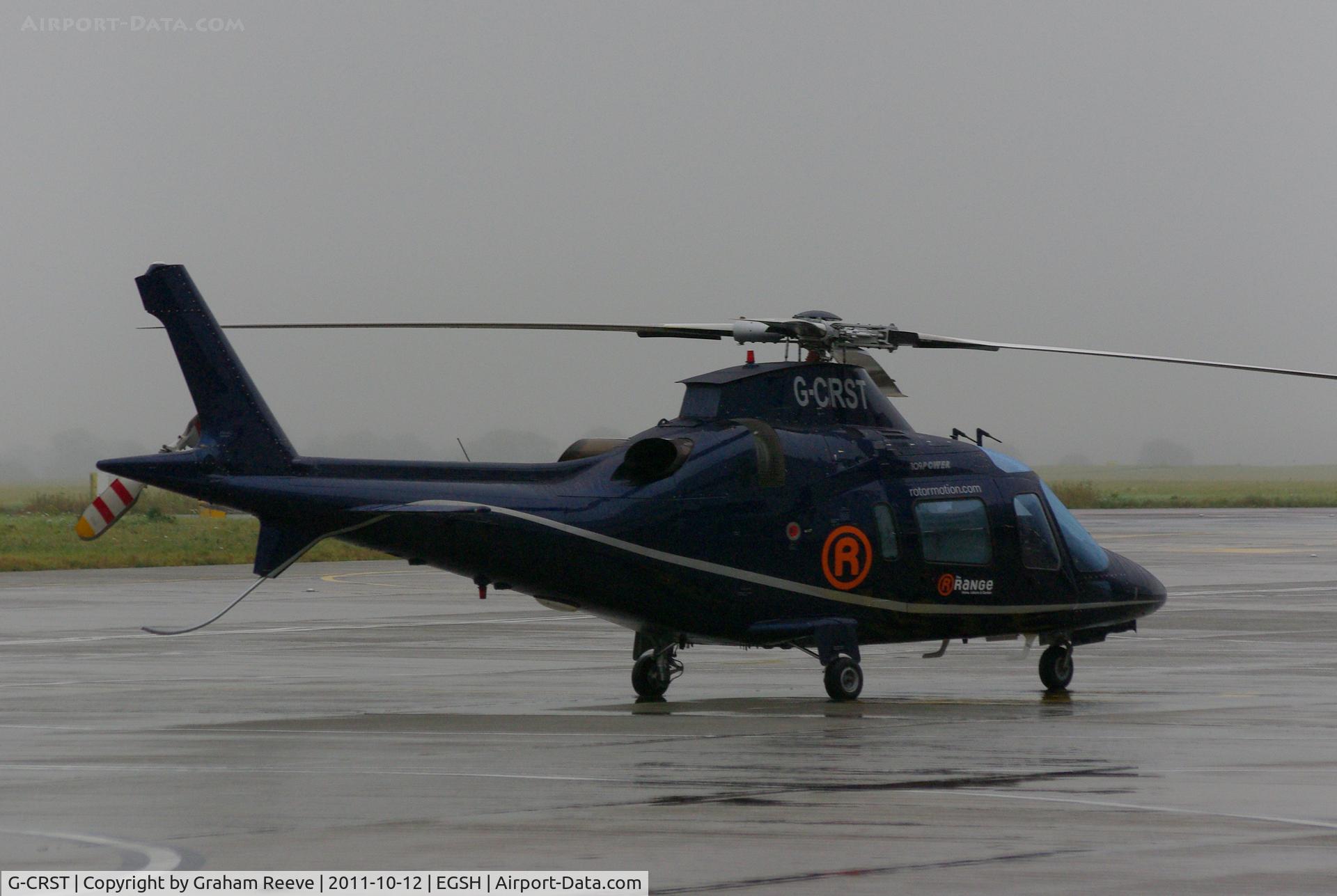 G-CRST, 1998 Agusta A-109E Power C/N 11017, On a wet dark afternoon.
