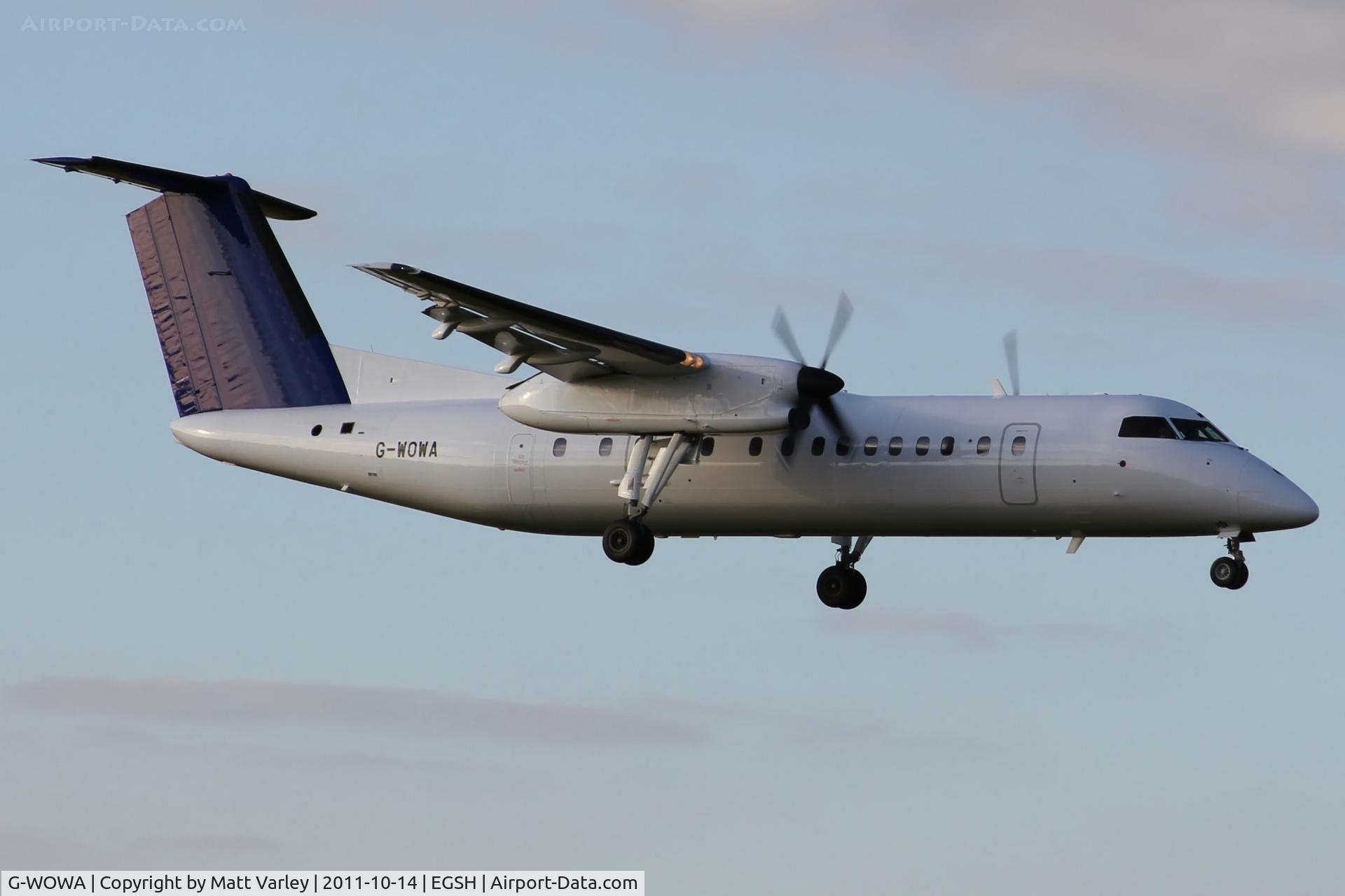 G-WOWA, 1992 De Havilland Canada DHC-8-311 Dash 8 C/N 296, East flight 1773 arriving with Swansea city fc on board.