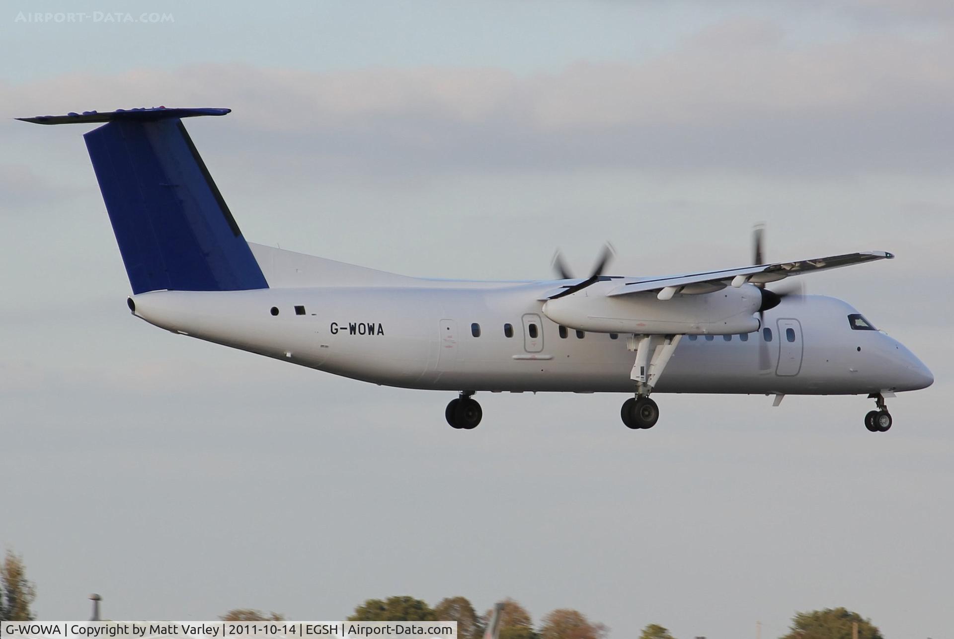 G-WOWA, 1992 De Havilland Canada DHC-8-311 Dash 8 C/N 296, East flight 1773 arriving with Swansea city fc on board.