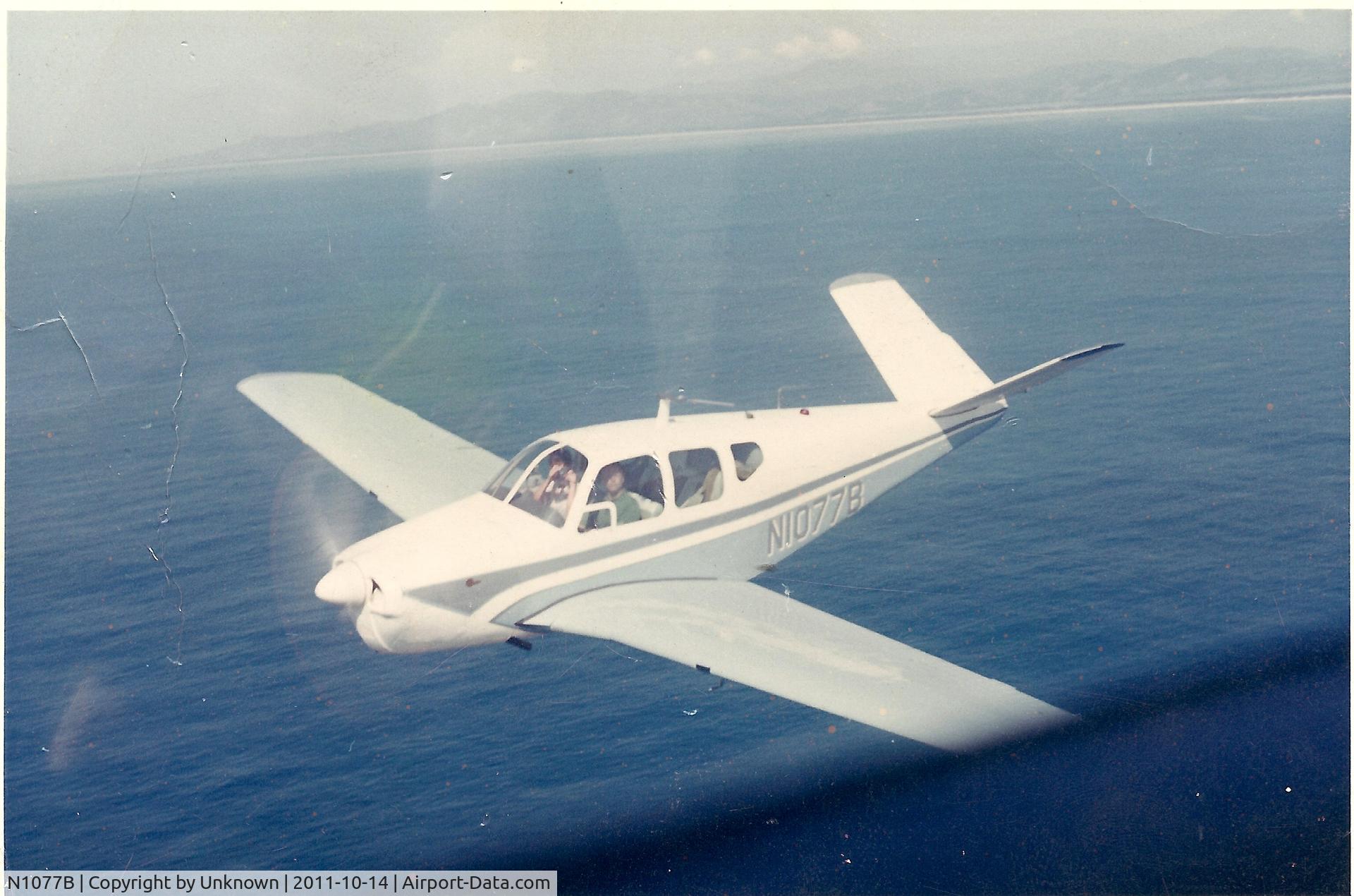N1077B, 1957 Beech H35 Bonanza C/N D-4931, Flying off the coast of Santa Barbara in the early 1960's with my father (Ken St.Oegger) at the controls.