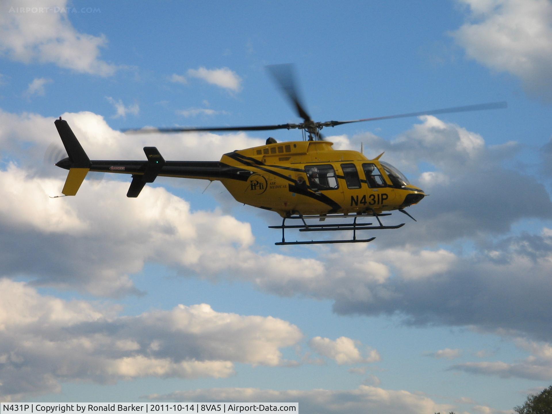 N431P, Bell 407 C/N 53857, Departing UVA