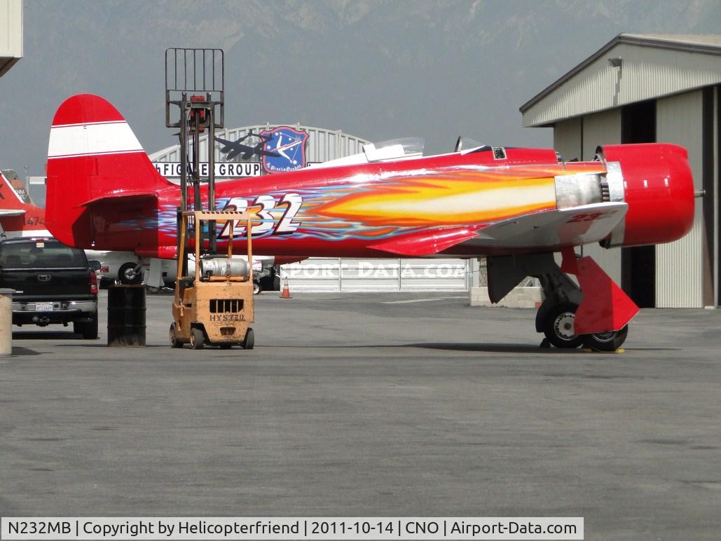 N232MB, 1947 Hawker Sea Fury FB.11 C/N 41H/609972, Parked to rear of Planes Of Fame, in her Mike Brown, racing colors