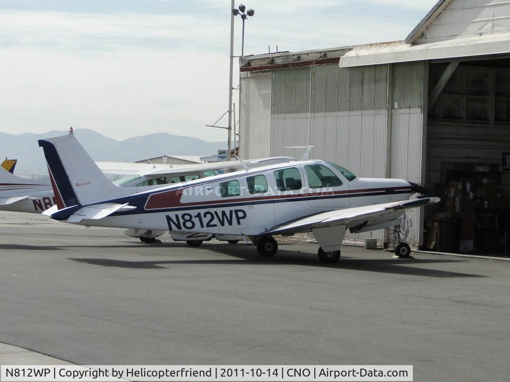 N812WP, 1975 Beech A36 Bonanza 36 C/N E-669, Parked at a hanger