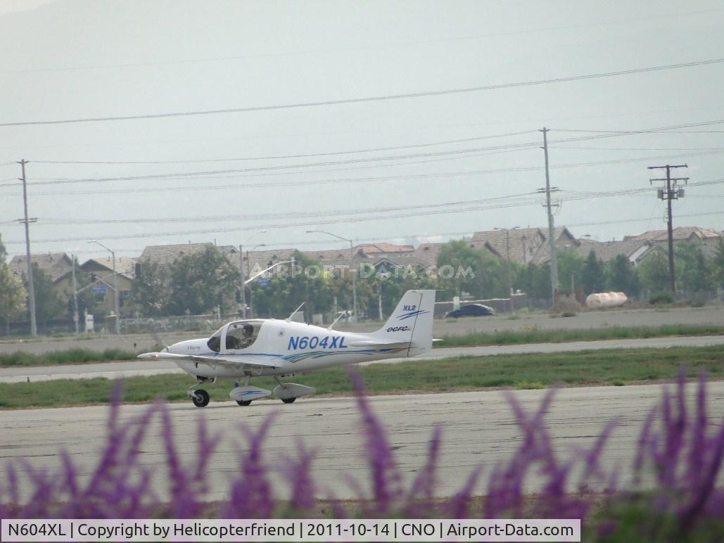 N604XL, 2007 Liberty XL-2 C/N 0080, Taxiing eastbound south of the tower