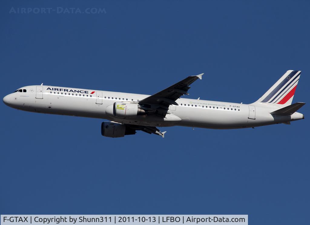 F-GTAX, 2009 Airbus A321-212 C/N 3930, Taking off from rwy 32R with additional 'Le vol le plus économique en CO2' titles and green patch on engine. It was the first flight with a bio carburant between TLS and ORY used by Air France...