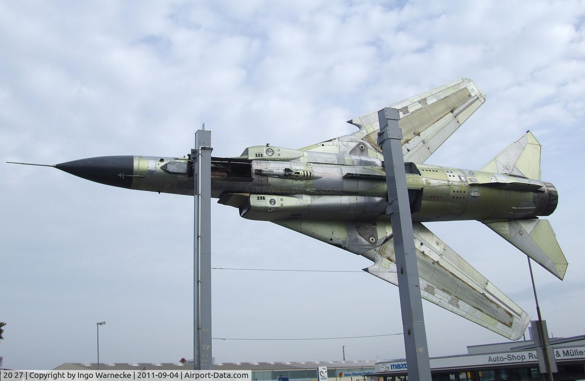 20 27, 1982 Mikoyan-Gurevich MiG-23ML C/N 0390324018, Mikoyan i Gurevich MiG-23ML FLOGGER-G (ex LSK/LV tactical Nr. 550, ex Luftwaffe 20 27), stripped of all paint to show the different materials at the Auto & Technik Museum, Sinsheim
