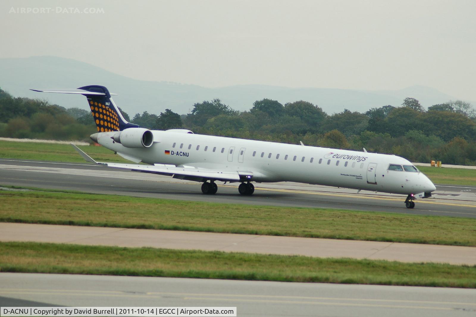 D-ACNU, 2011 Bombardier CRJ-900 NG (CL-600-2D24) C/N 15265, Eurowings Bombardier Canadair CRJ-900NG taxiing Manchester