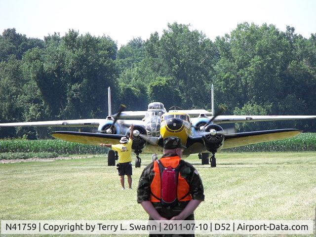 N41759, 1944 Cessna UC-78 (T-50) Bobcat C/N 5807, Being followed after landing at the 2011 Geneseo Air Show. A beautiful day for flying.