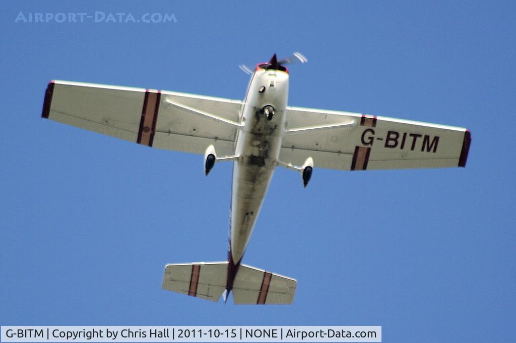G-BITM, 1981 Reims F172P Skyhawk C/N F17202046, Barton based C172 over Oulton Park race course